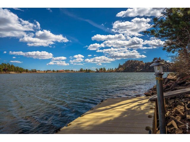 Property Photo 6 Dock on Hiawatha Lake - wake up to cast a line, kayak, or drink your cup of coffee with these views