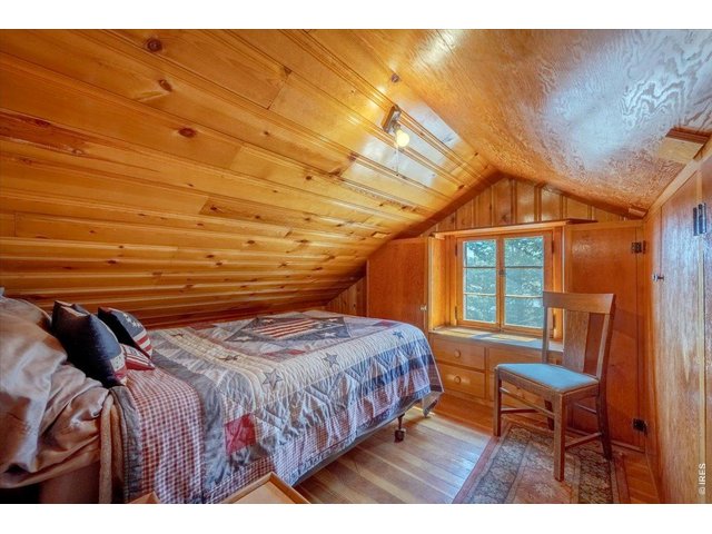Property Photo 21 Upstairs could be used as 2 separate bedrooms/sleeping areas, or as 1 bedroom with a bonus room across the hall.