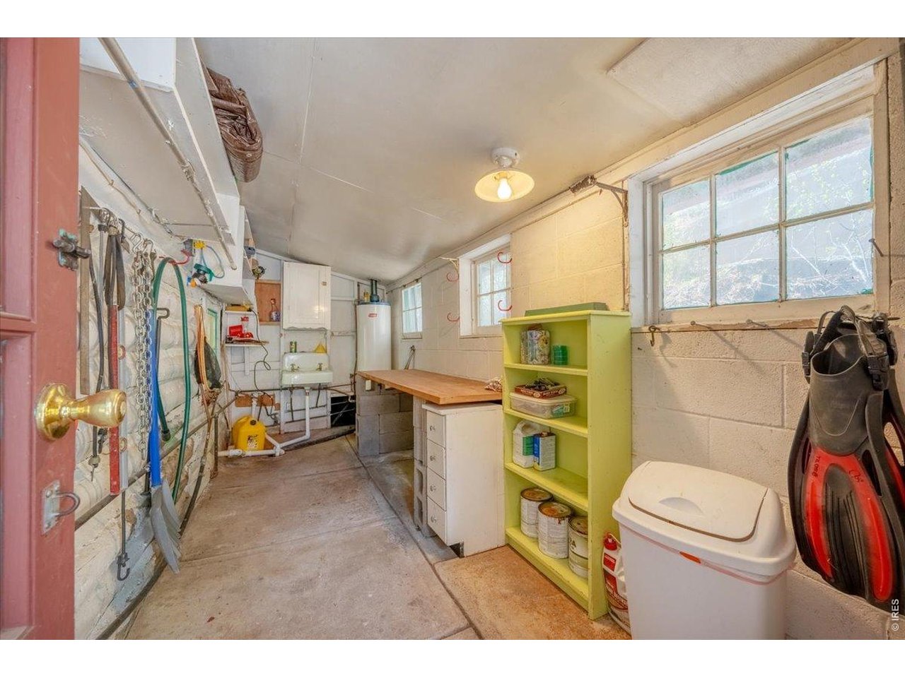 Entry from outdoors into a useful utility and storage room.