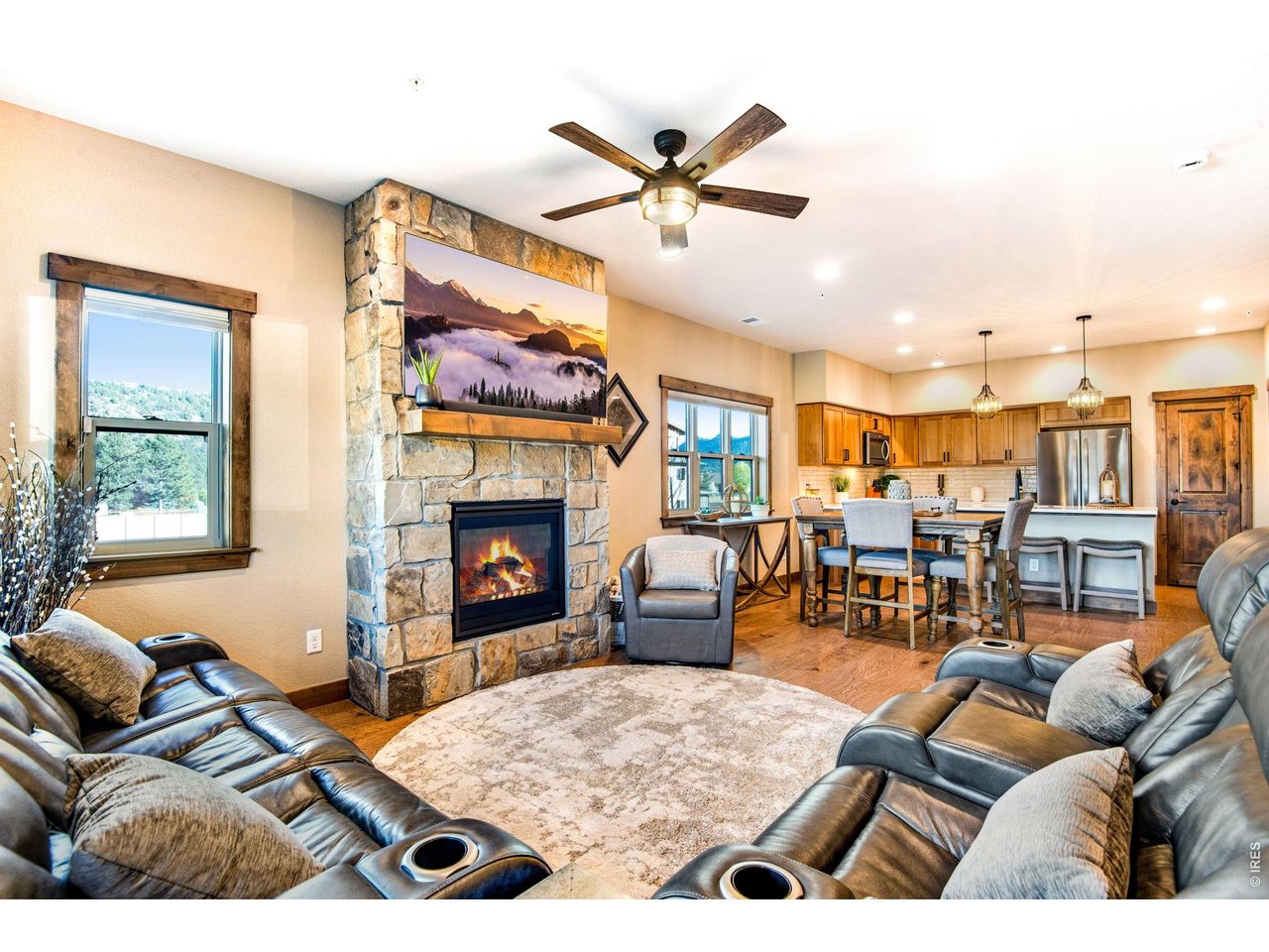 Gas fireplace with floor to ceiling stone.