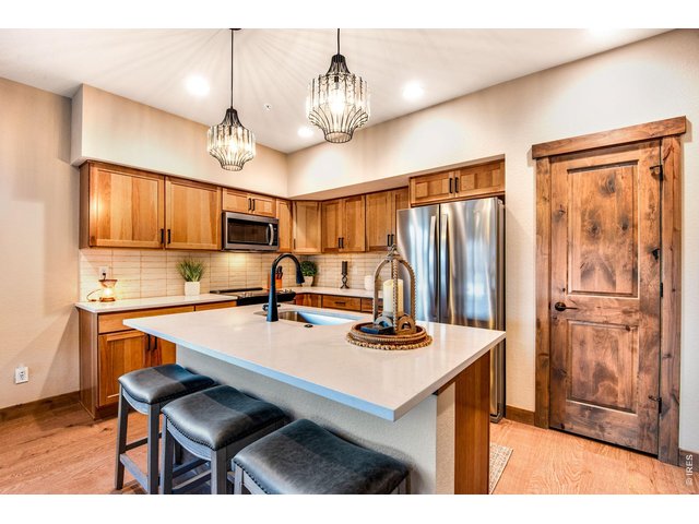 Property Photo 20 Quartz countertops and solid wood cabinets, trim and doors.