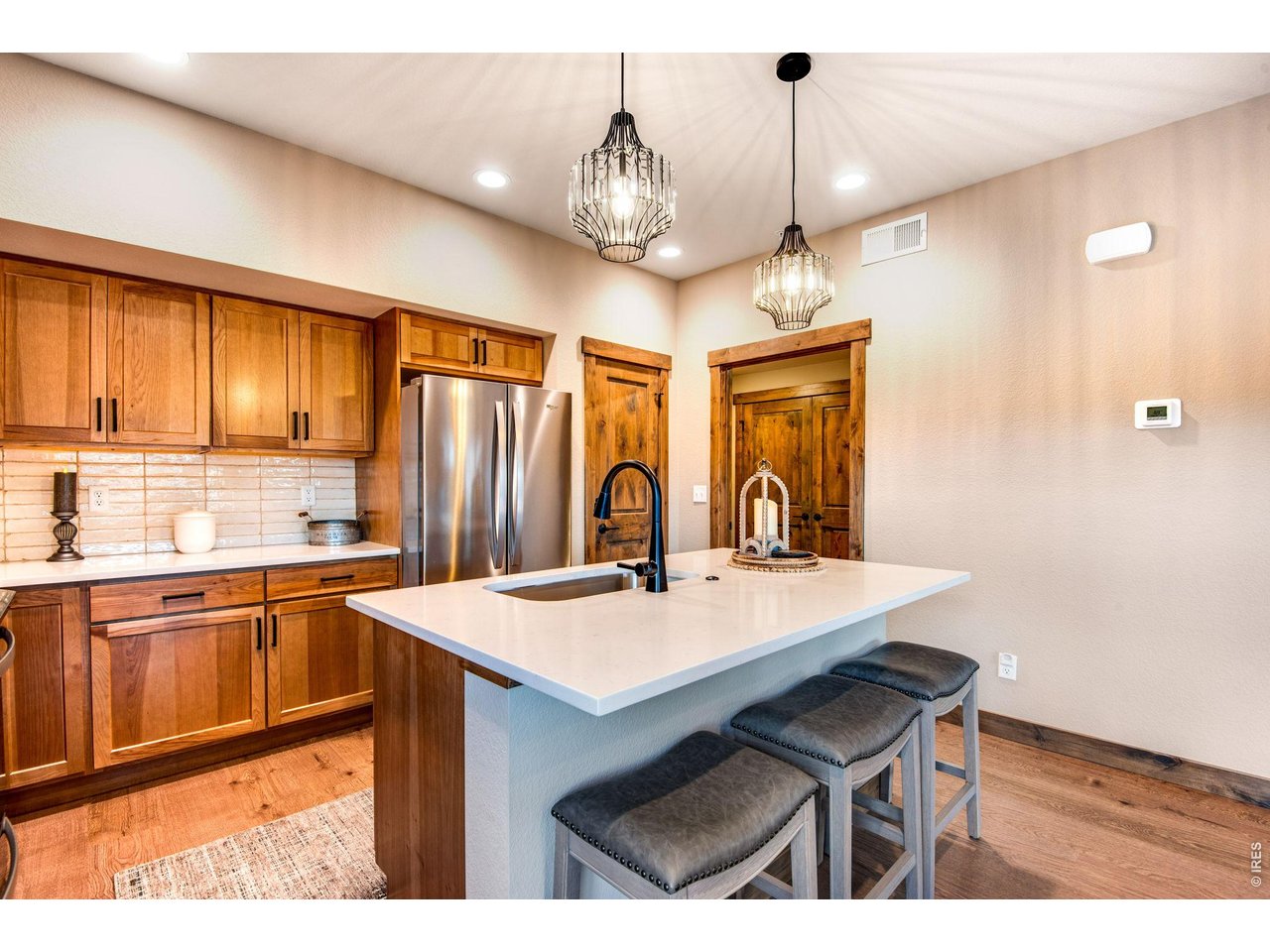 Custom light fixtures and soft close cabinets.