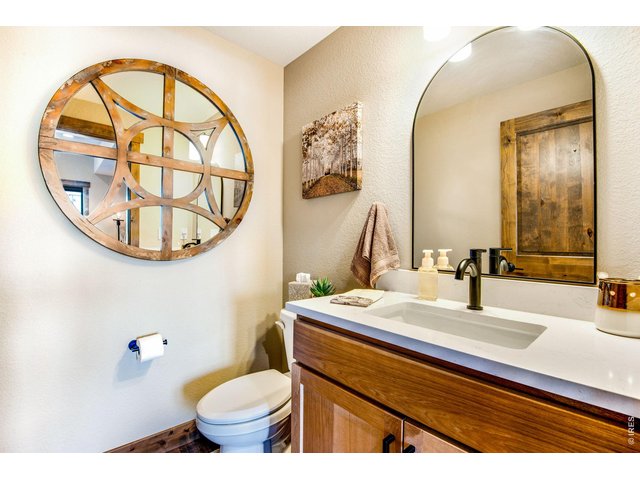 Property Photo 27 Main level half bathroom.