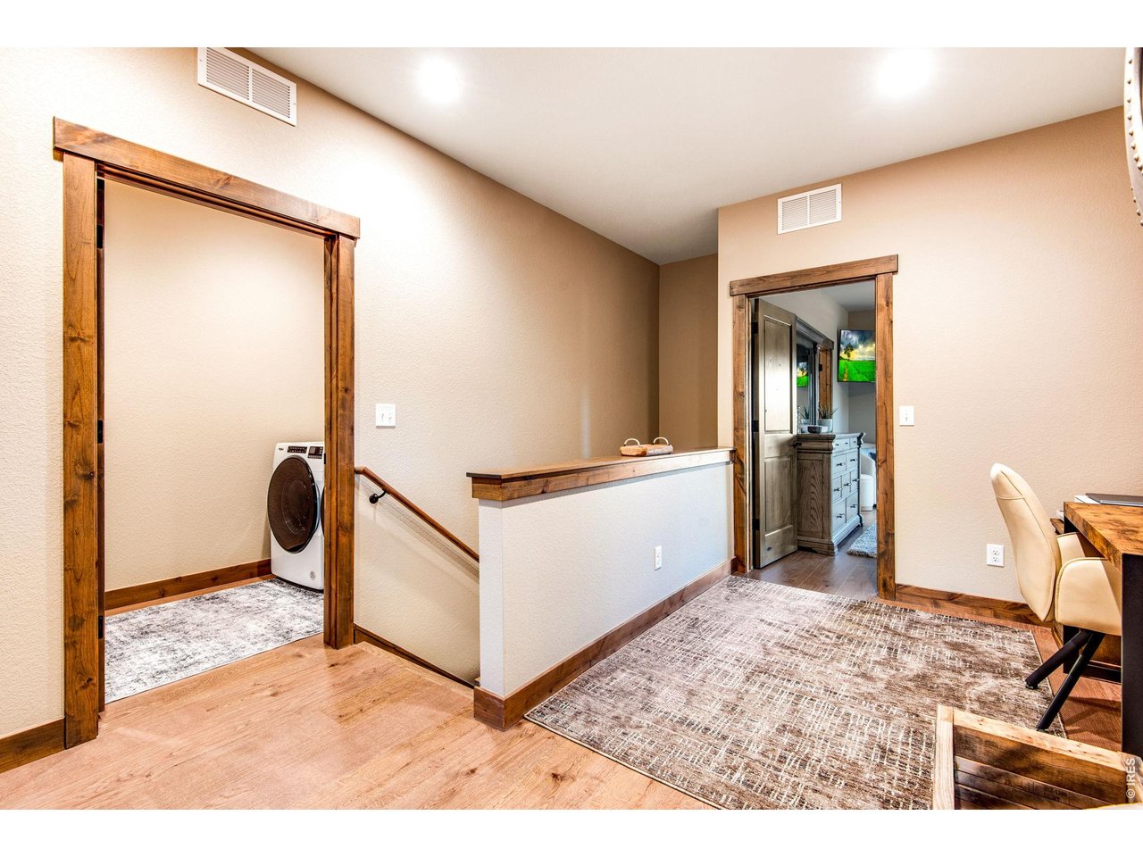 Upstairs office space and laundry room.