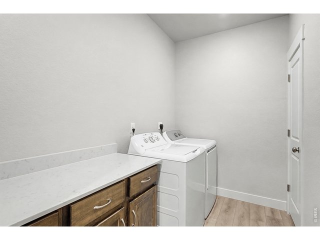 Property Photo 16 Large laundry room with built in cabinets included! 