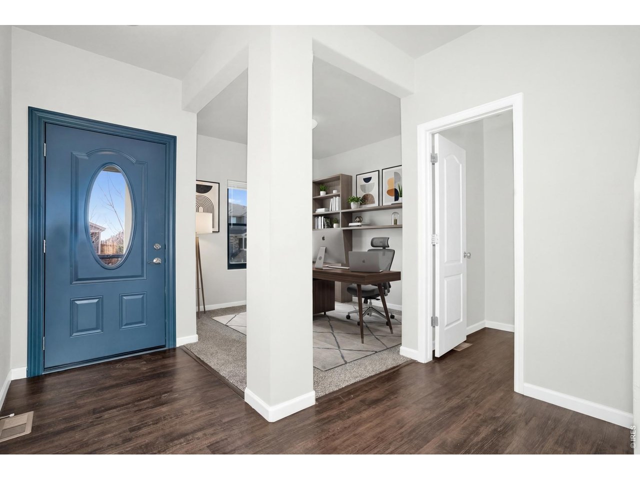 Step into a spacious, inviting foyer,that immediately sets a warm welcoming tone for the home. 