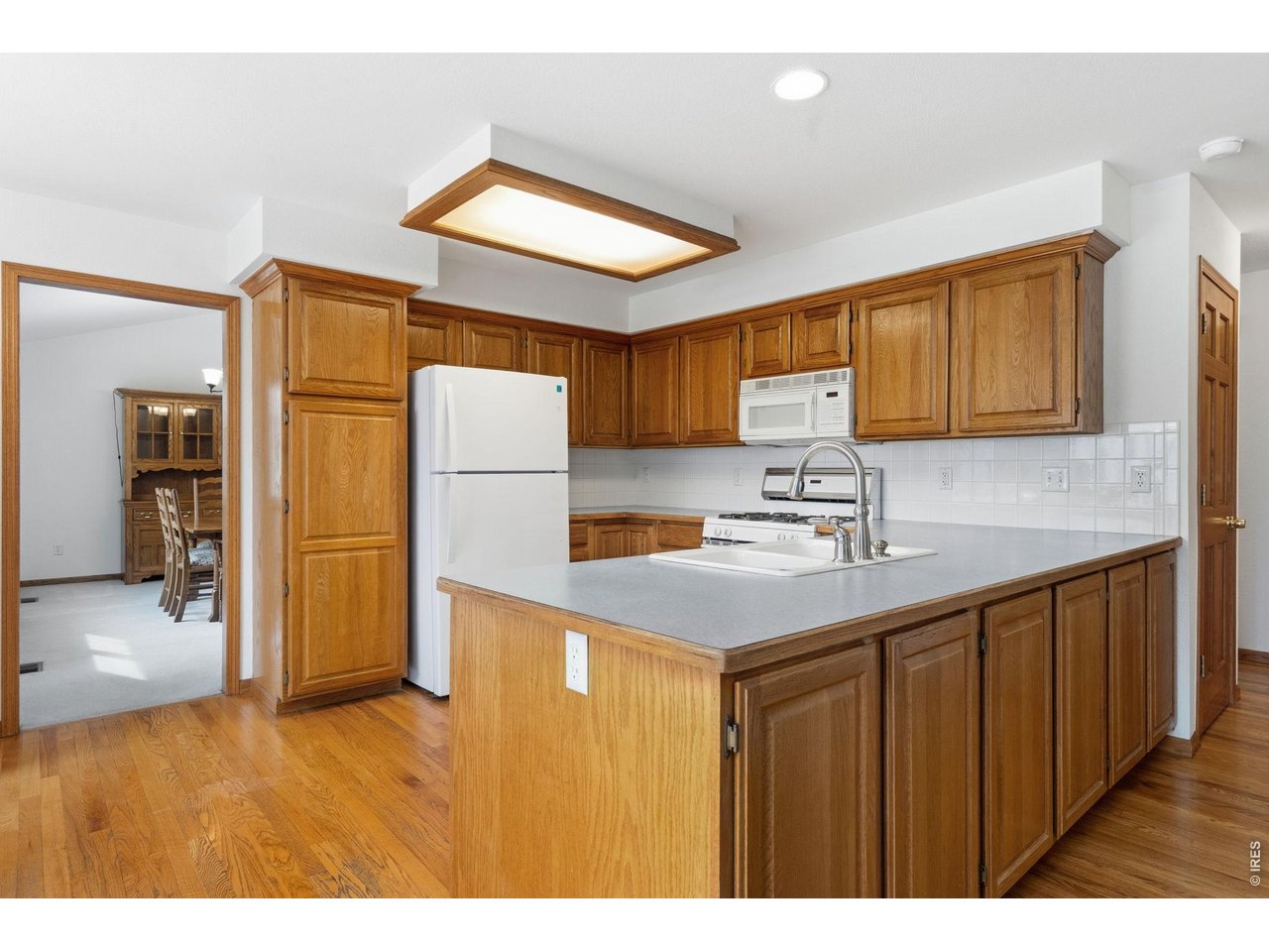 Spacious kitchen, with lots of cabinets. 