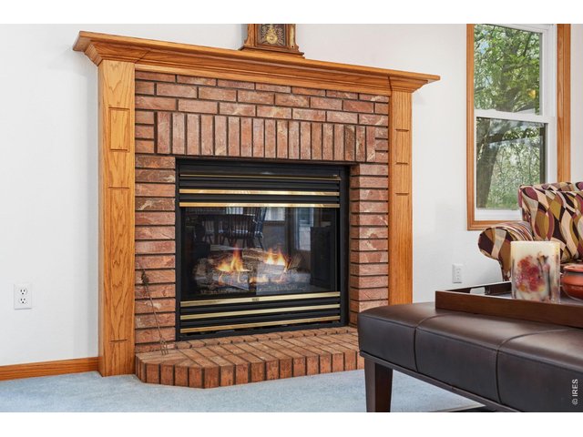 Property Photo 20 Fireplace with beautiful brick. 