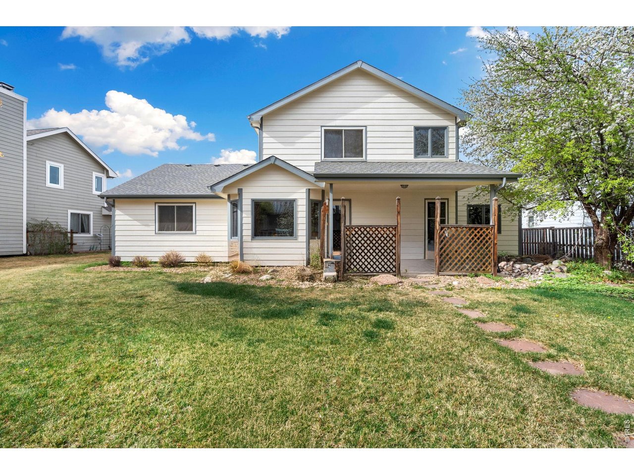 Rear of the home and backyard. 