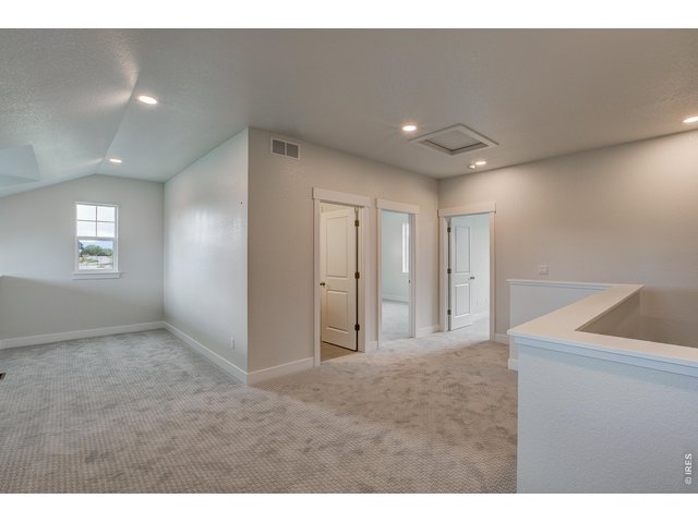 Property Photo 22 Upstairs loft/flex space perfect for a home office & exercise area. 