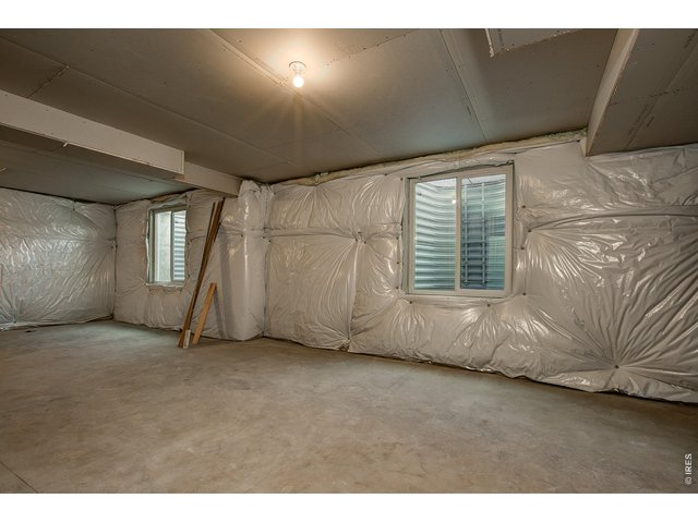 Property Photo 33 Unfinished basement to finish or use for storage. 