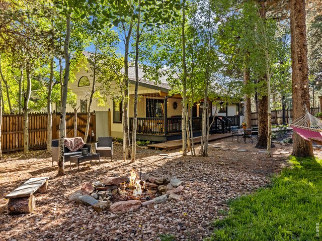 Property Photo 6 Backyard firepit for stories and music