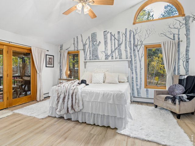 Property Photo 33 Private primary suite with french doors to the deck