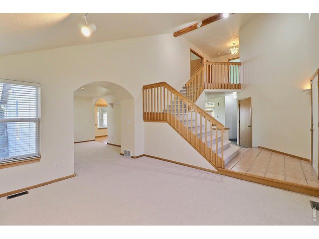 Property Photo 6 Beautiful Entryway Into Formal Living Room