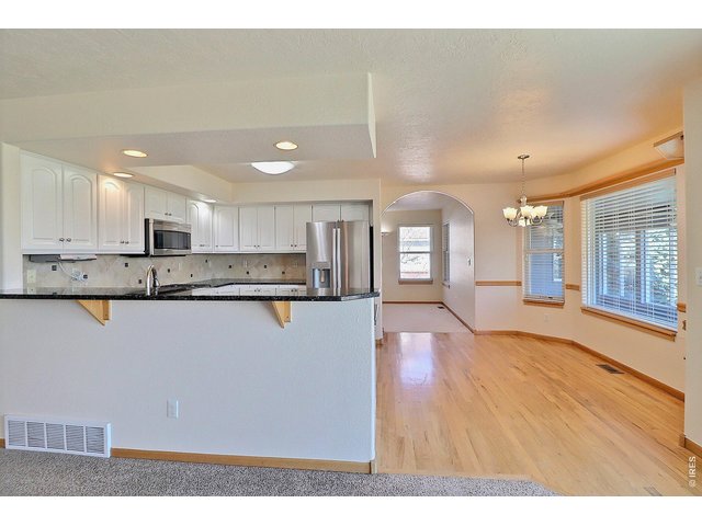 Property Photo 13 Granite Countertops and Breakfast Bar