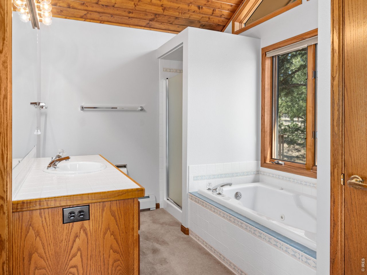 Primary bath with soothing jetted tub