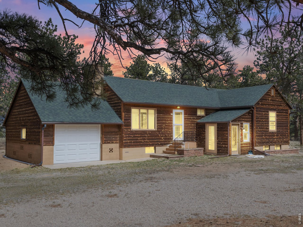 A rare opportunity to enjoy a classic Estes Park mountain home in a serene location with charm, views, and room to make it your own