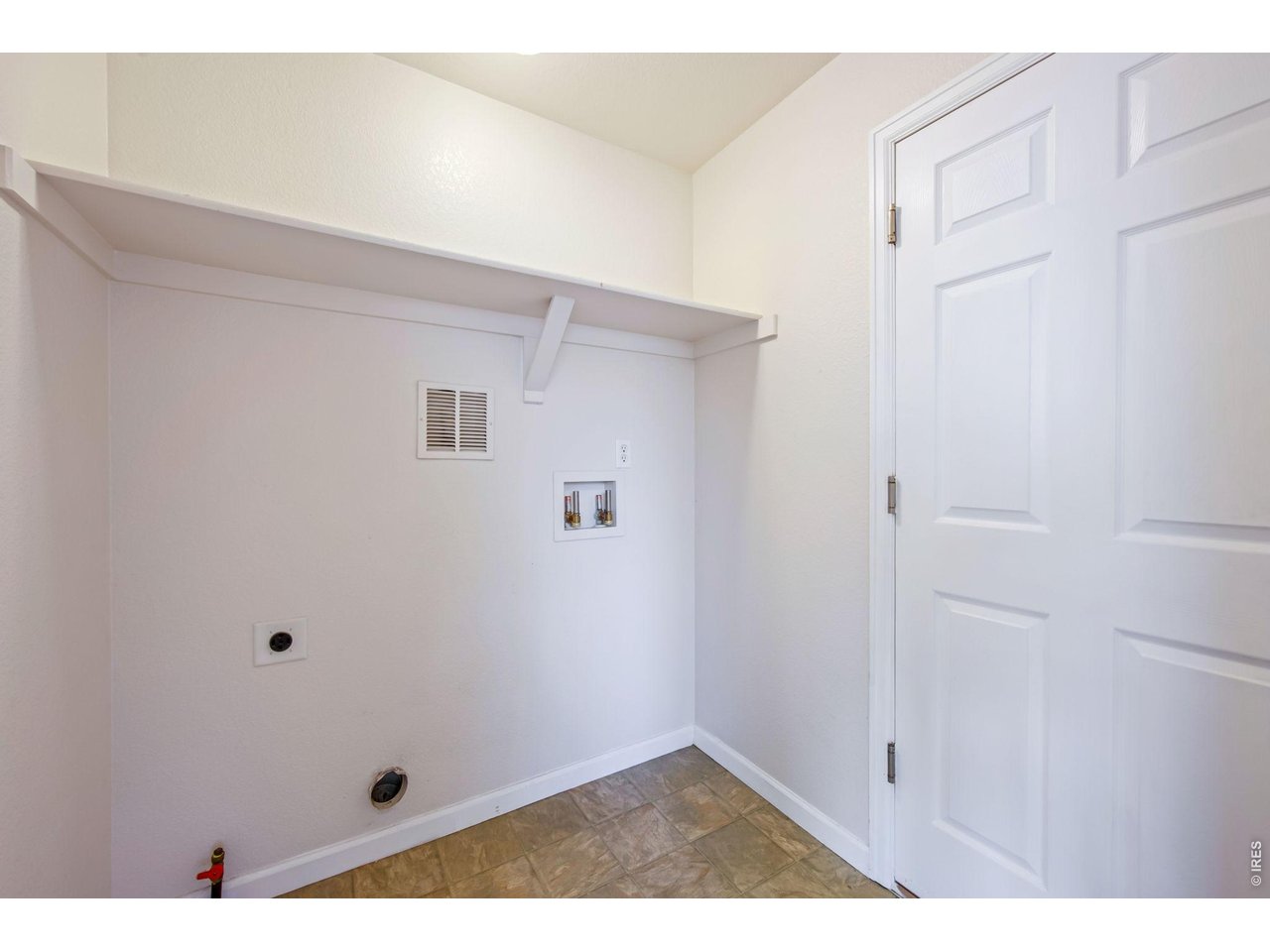 Convienient main floor laundry and mudroom right off garage. 