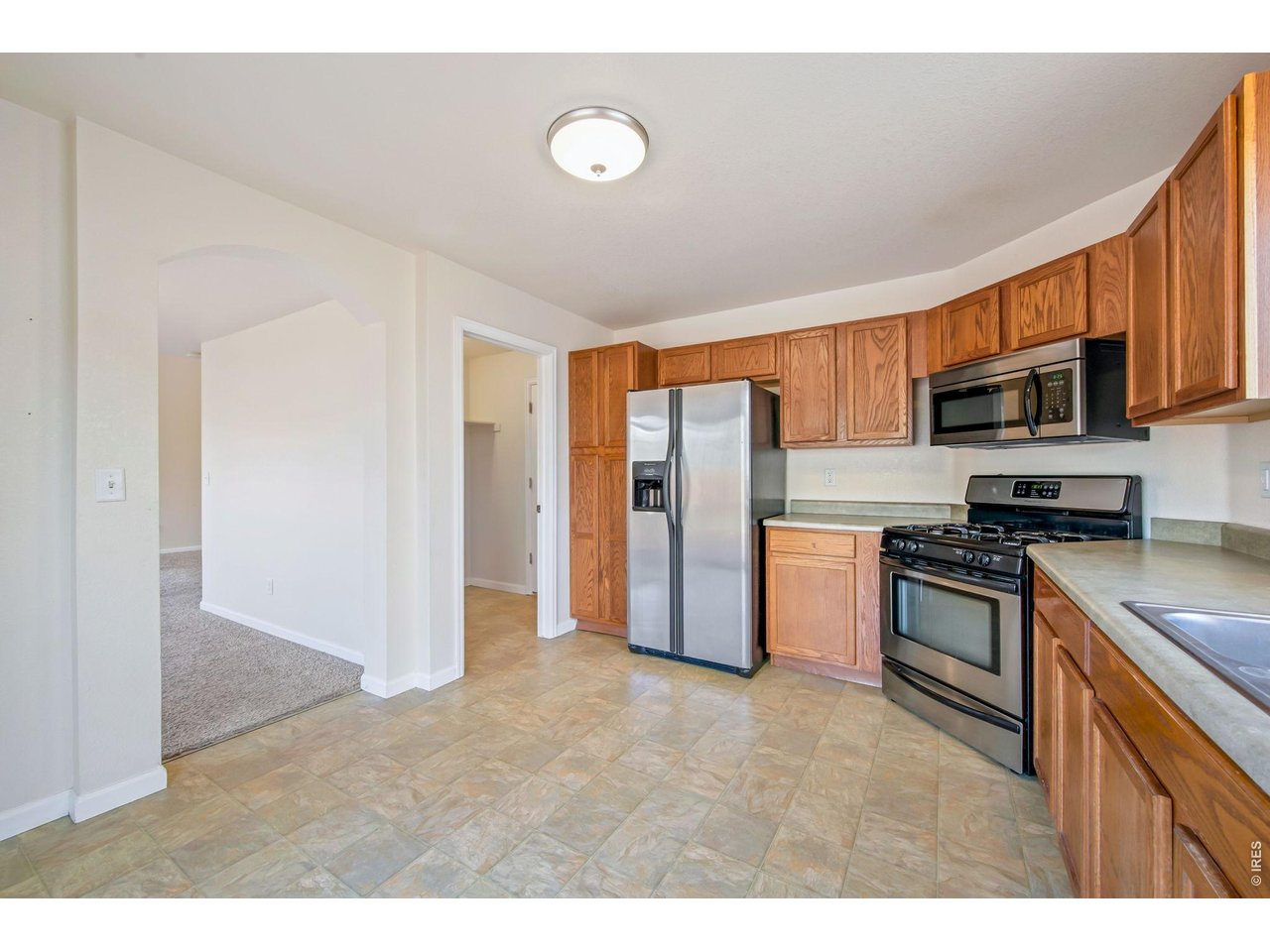 Kitchen to mudroom and dining room. 