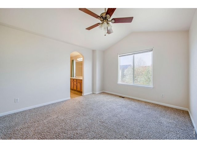 Property Photo 17 Vaulted Primary Bedroom ceiling