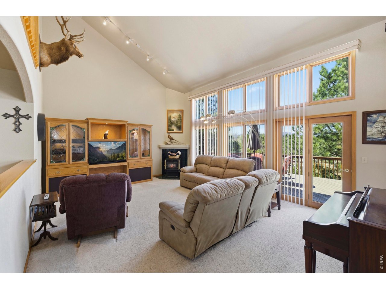 Vaulted Family Room with Floor to Ceiling Windows!