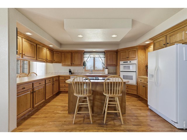 Property Photo 12 Big Country Kitchen with beautifully maintained real Hard Wood Floors