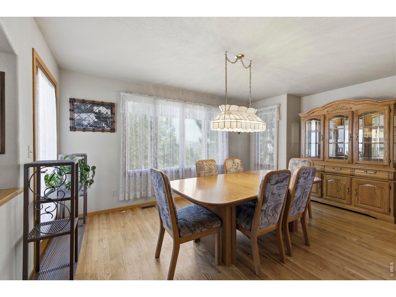 Formal Dining Room with well designed room plan to hold the largest of Dining Hutches or Buffets