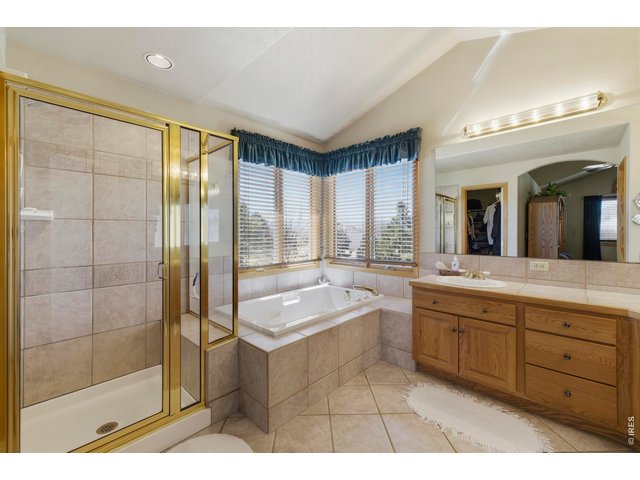 Property Photo 25 Big Soaking Tub with Corner Windows, Separate Walk-In Shower and Double Vanity, Tile Floors