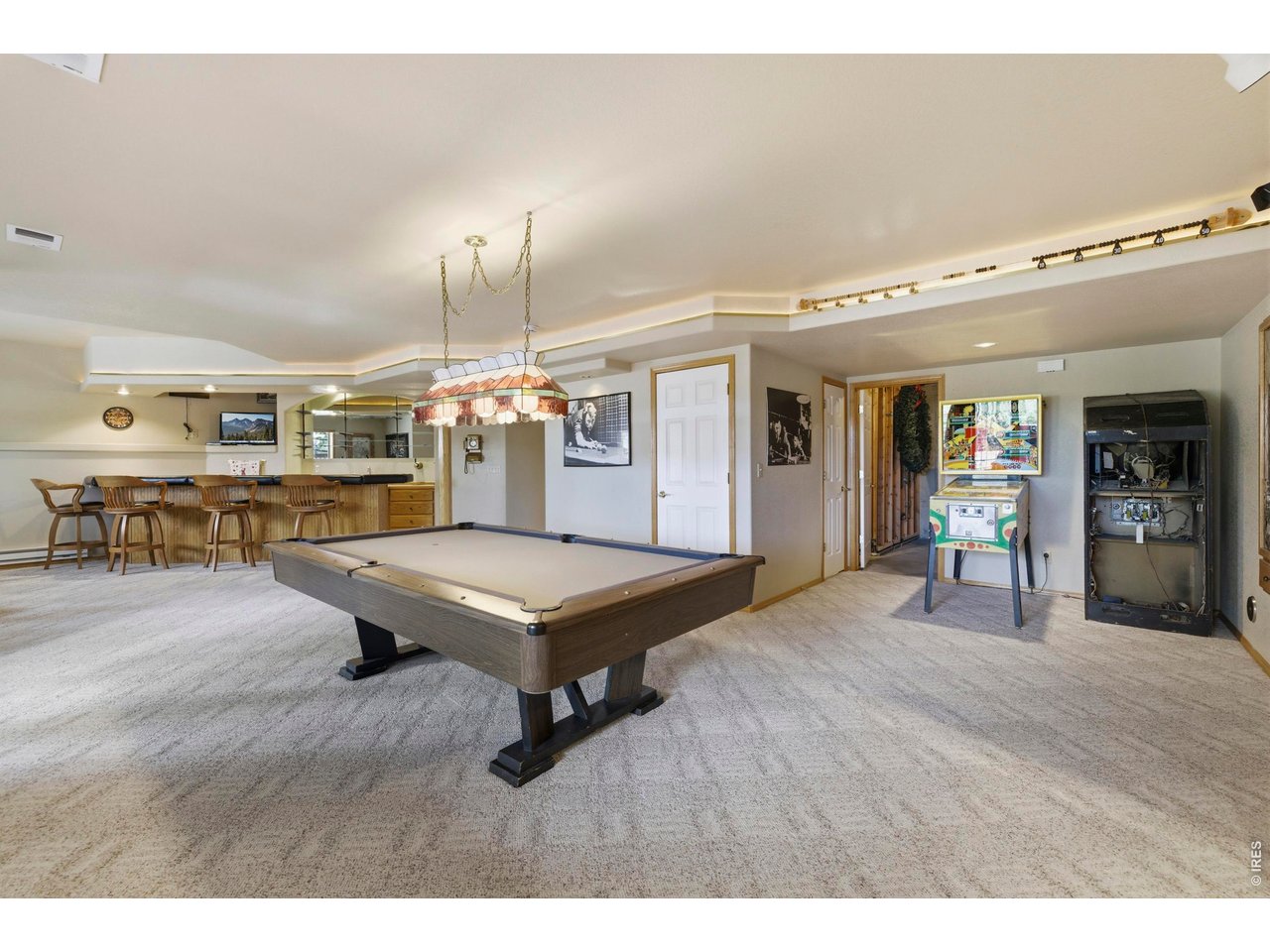 Large Built-In Wet Bar, Refrigerator, Microwave, Pool Stick Cabinet (Pool Table and Light Excluded)