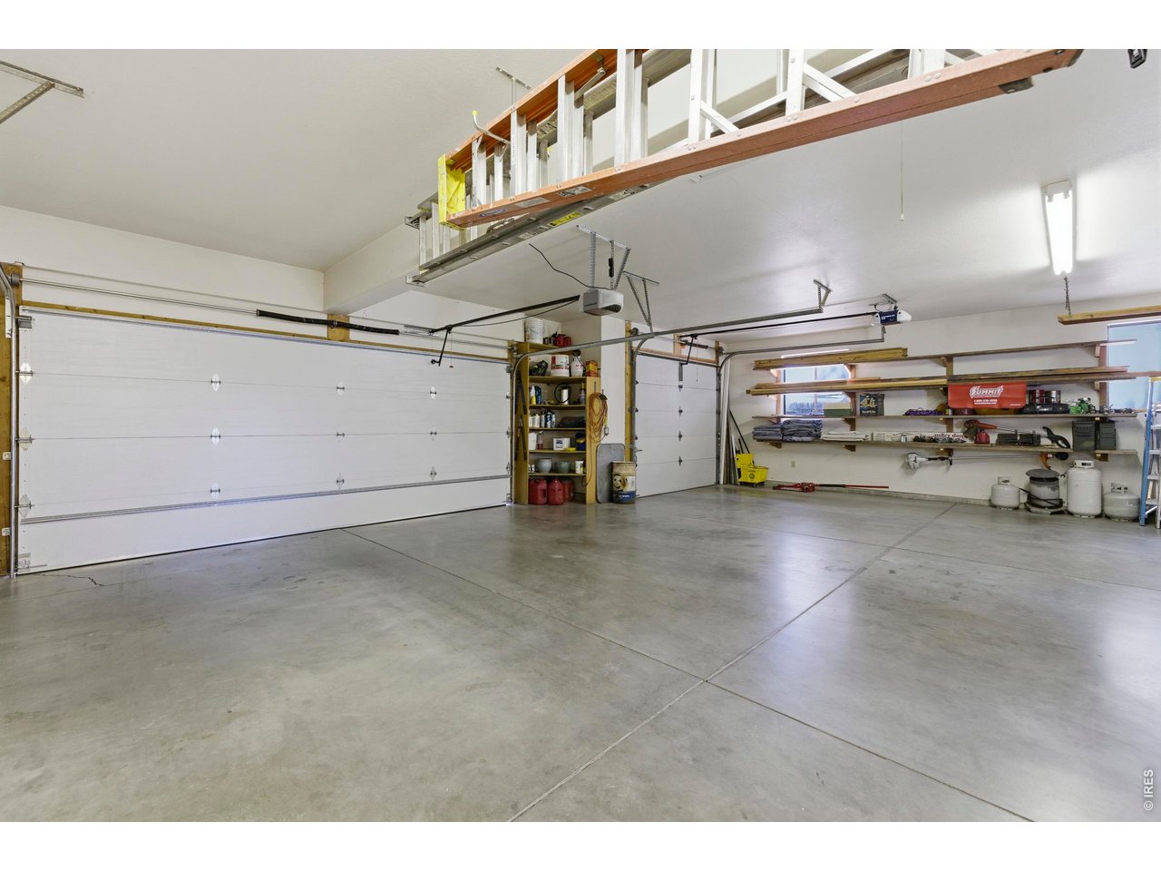 Immaculately clean and Insulated Attached 3 Car Garage