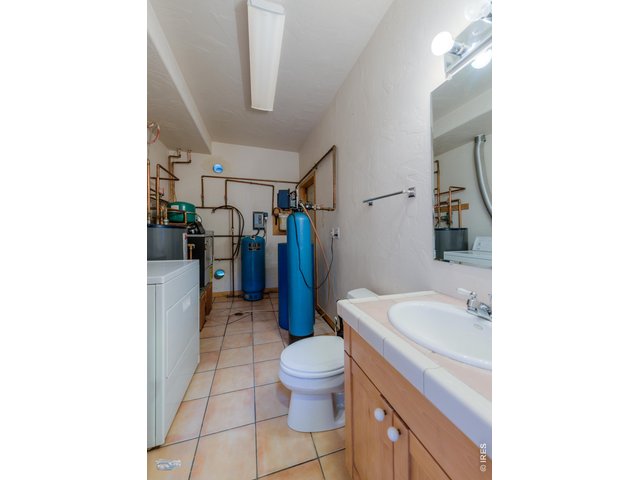 Property Photo 34 Man floor utility and laundry with 1/2 bath