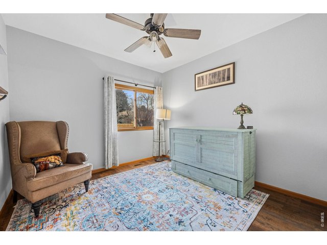 Property Photo 21 Main floor ensuite bedroom with 3/4 attached bath. Great for an office or multi-generational living