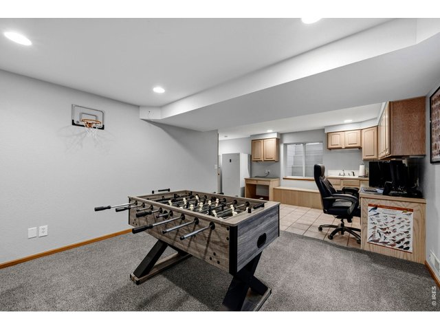Property Photo 41 Large rec room in basement with lots of built-ins