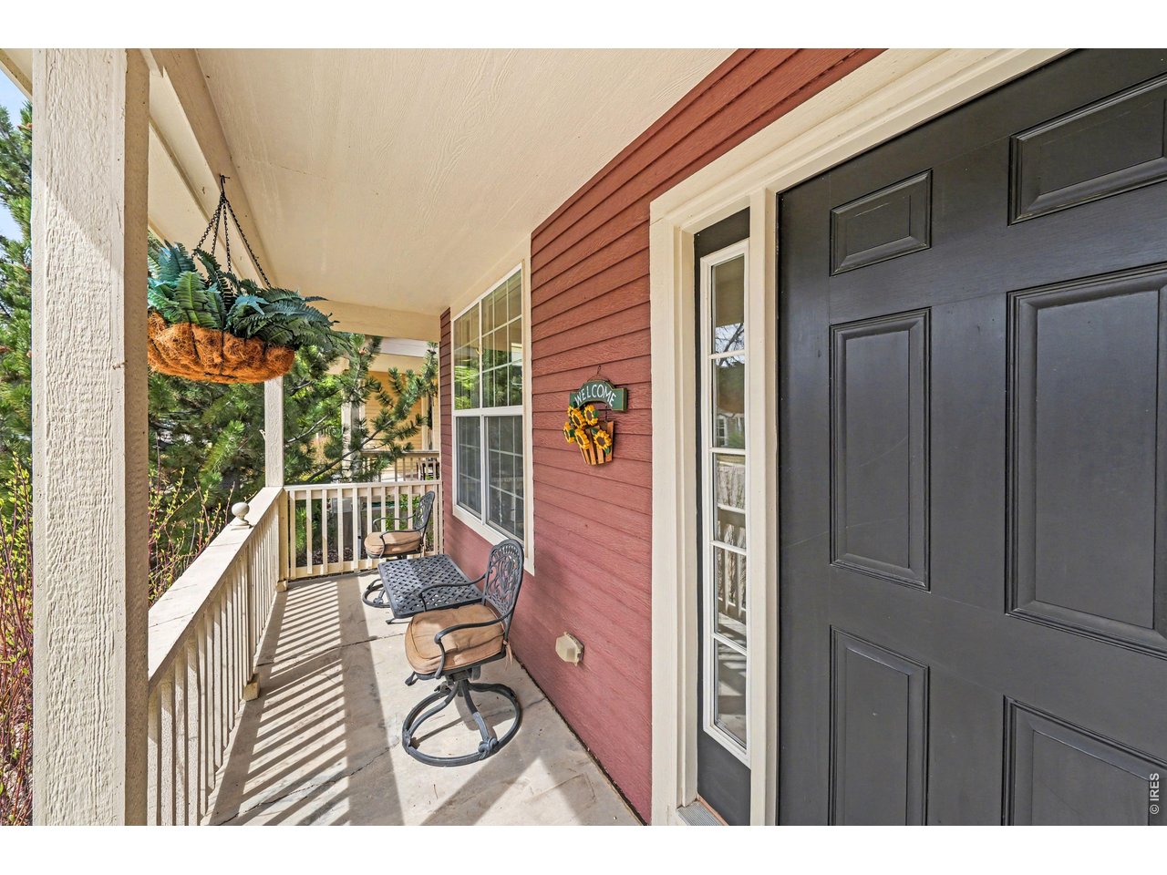 Front porch perfect for morning coffee and relaxation
