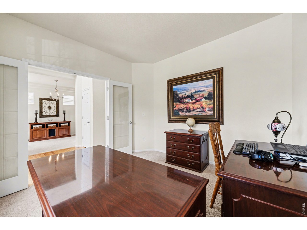 Private home office featuring elegant French doors