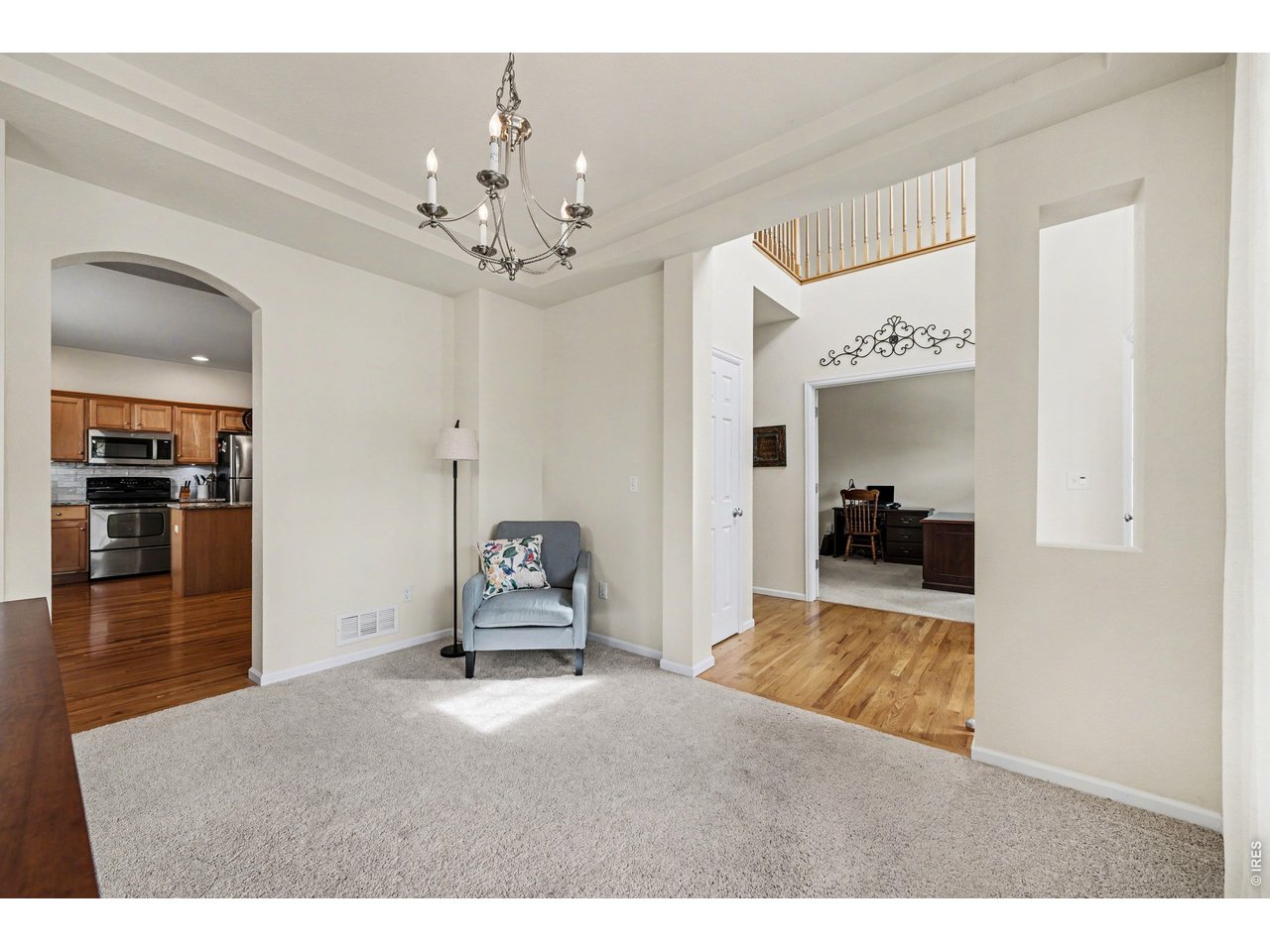 Main floor seamlessly connecting living, kitchen, and office