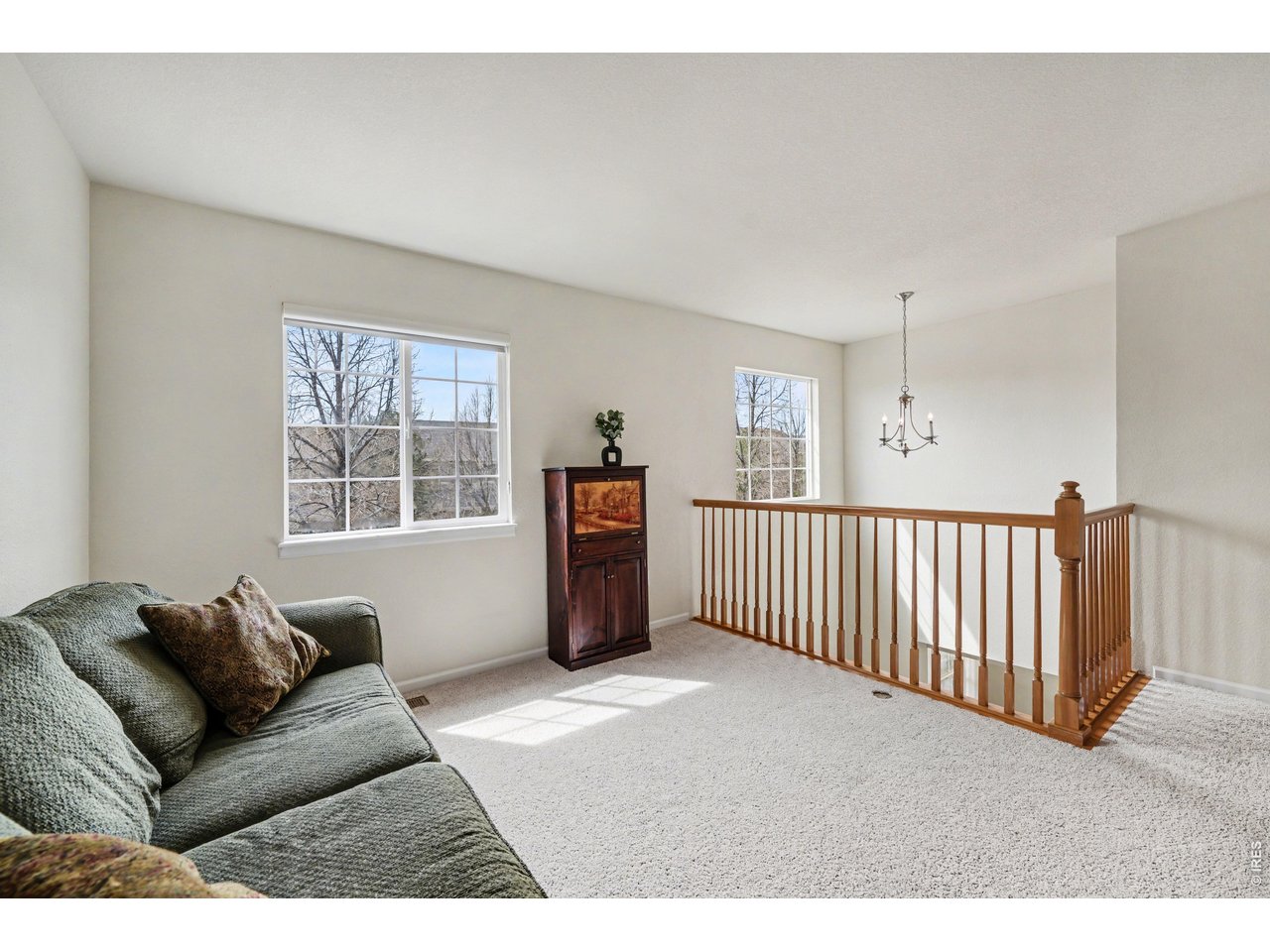Spacious upper-level loft providing a quiet getaway or a secondary media room