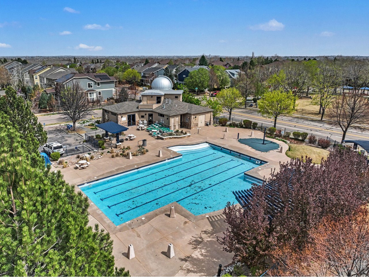 Take a dip in the sparkling community pool, a refreshing retreat for those warm summer days