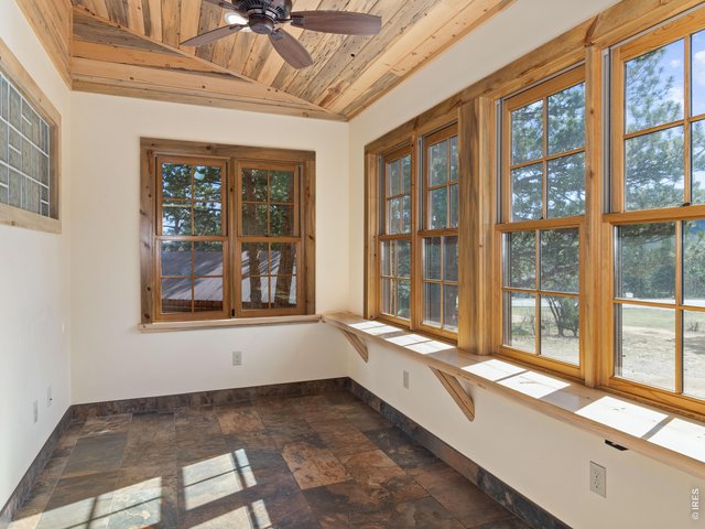 Property Photo 12 Sunroom with mountain views