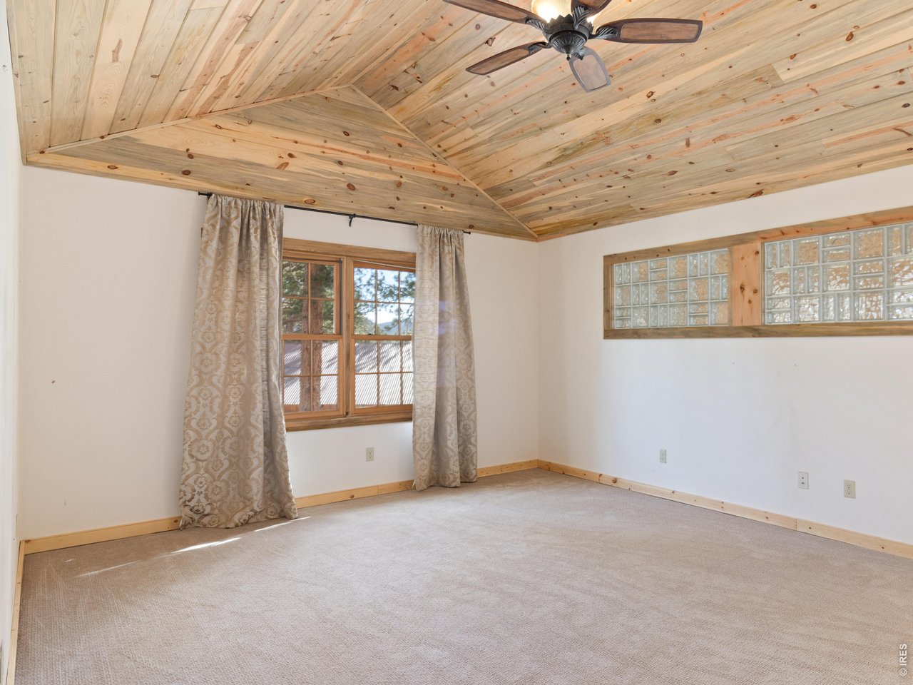 Primary bedroom with natural light