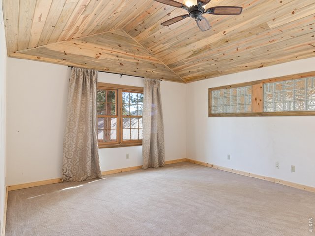 Property Photo 14 Primary bedroom with natural light