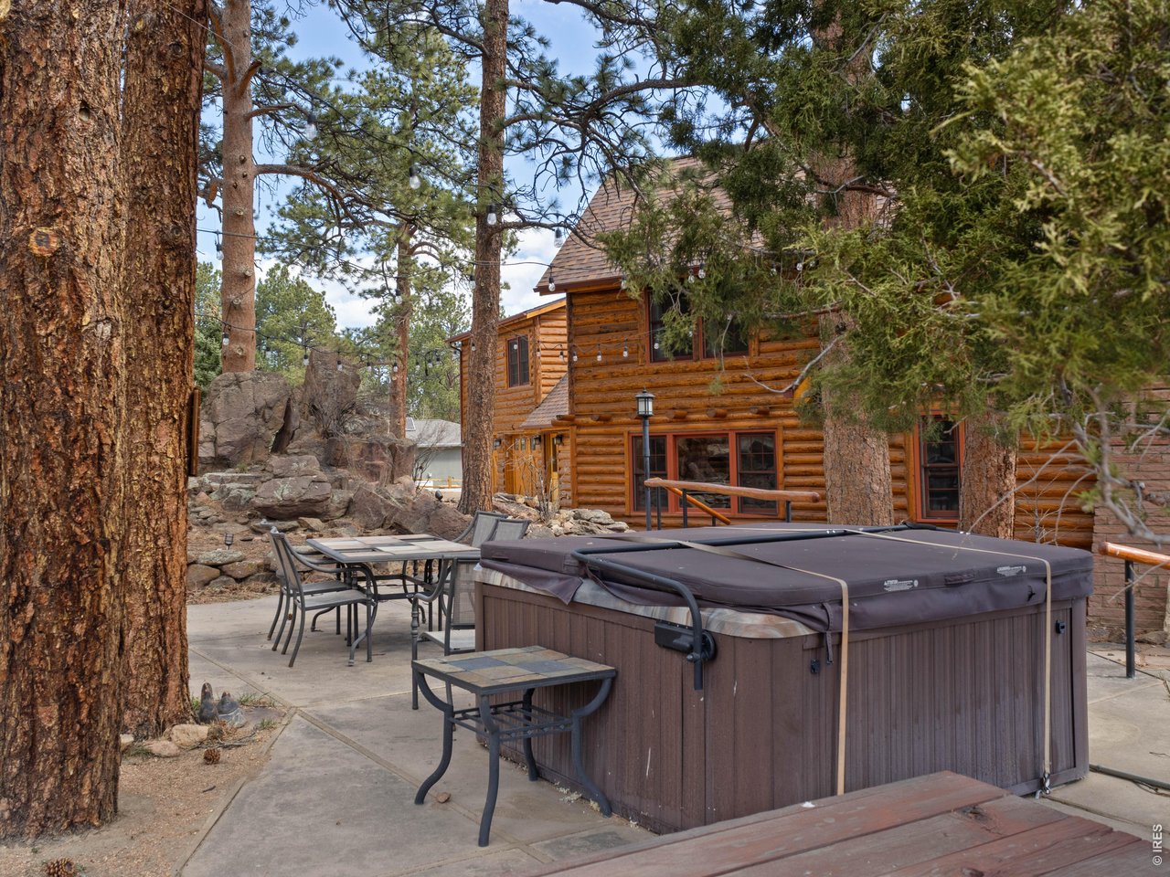 concrete patio with hot tub