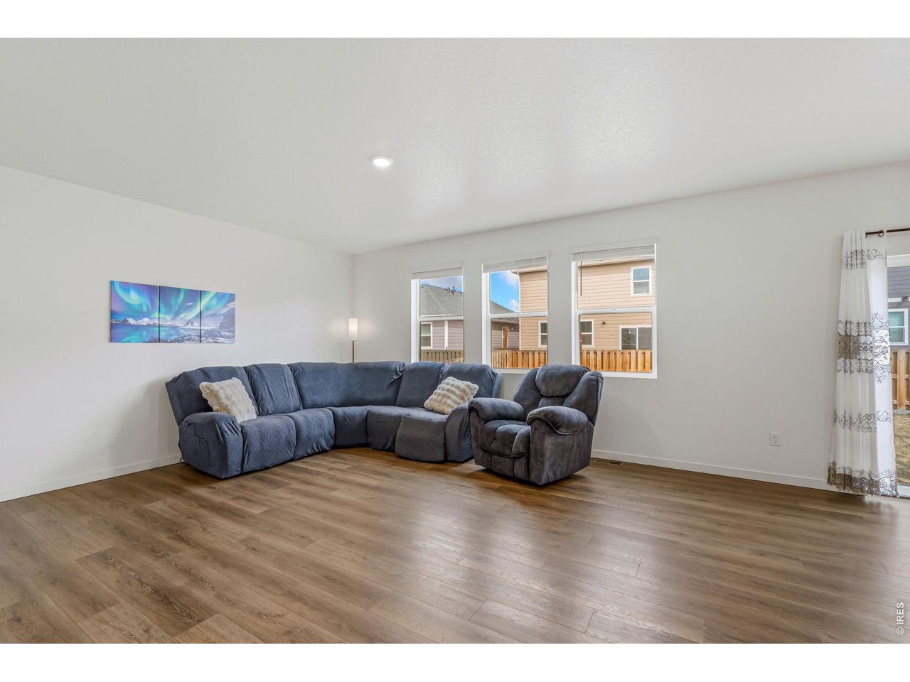 Step inside to an open, inviting floor plan where the expansive kitchen flows seamlessly into the dining area and main living space, perfect for entertaining!