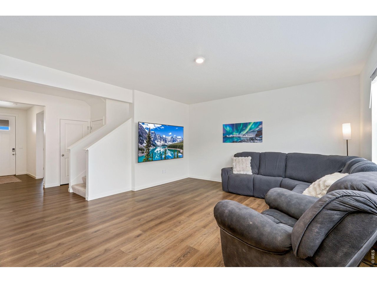 Step inside to an open, inviting floor plan where the expansive kitchen flows seamlessly into the dining area and main living space, perfect for entertaining!