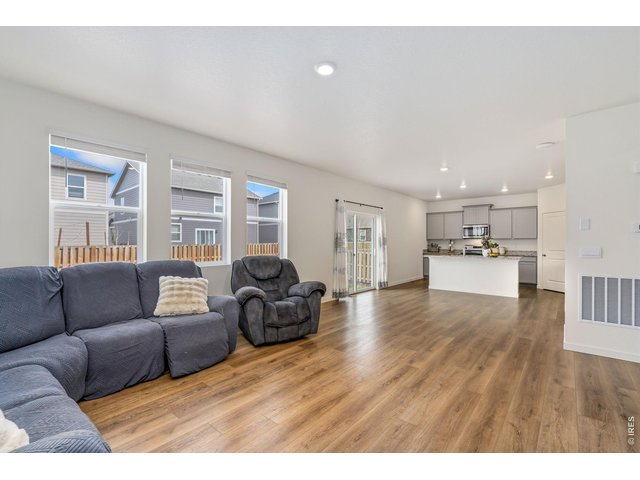 Property Photo 11 Natural light fills the home through well placed windows, creating a bright and welcoming atmosphere. 