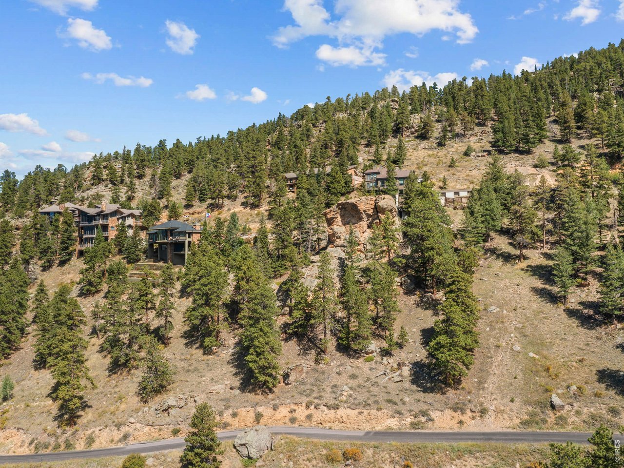 House will be right in the middle, next to the rock formation