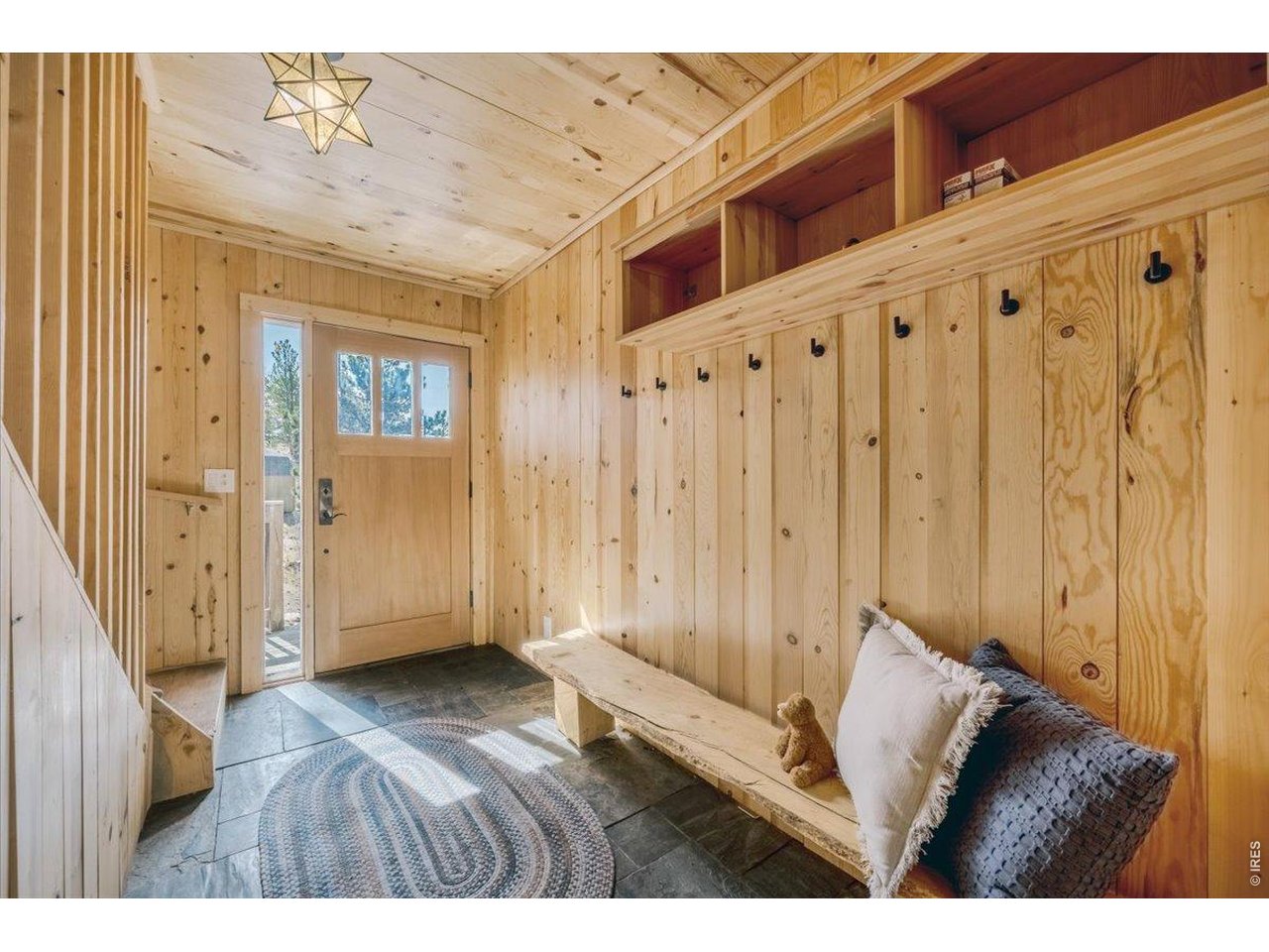 Large entry with mud bench