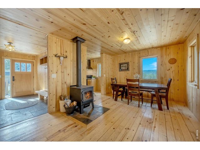 Property Photo 7 Cozy open concept with wood stove