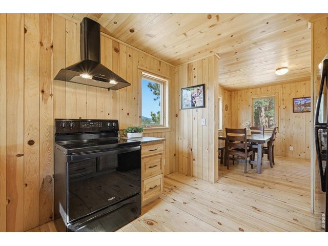 Property Photo 11 Large Kitchen with direct access to dining 