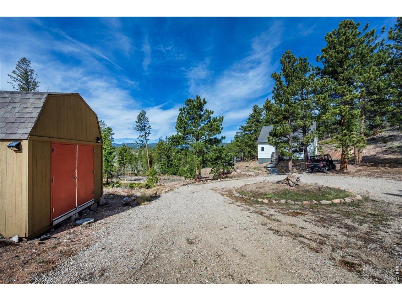 Circle drive with storage building
